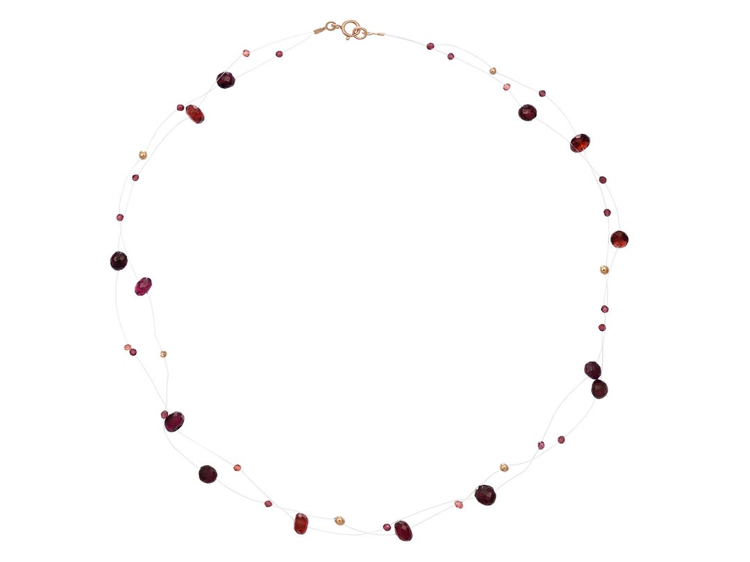 Aphaia - Floating Garnet beads on Nylon thread